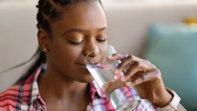 A lady drinking water