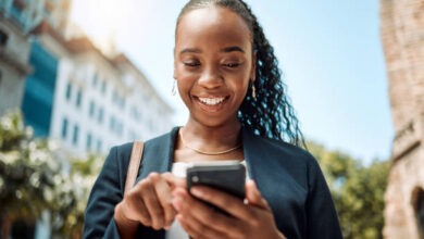 Black Lady Unsing Smartphones